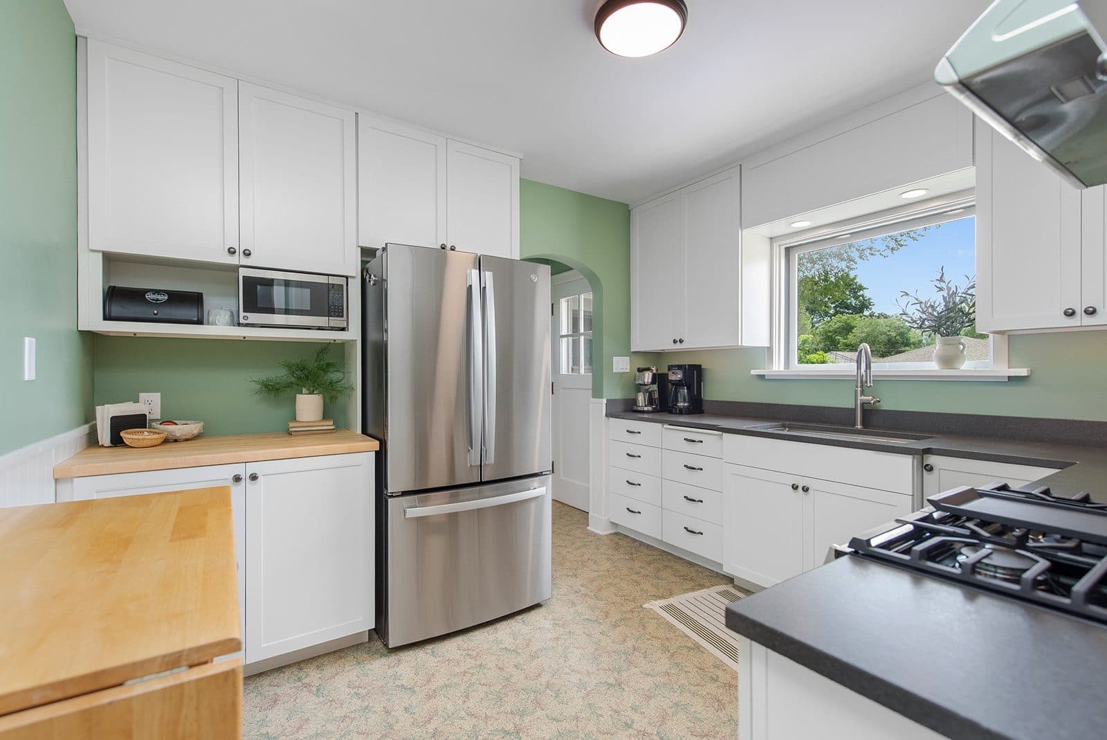 Fully remodeled kitchen with custom cabinetry by KCW